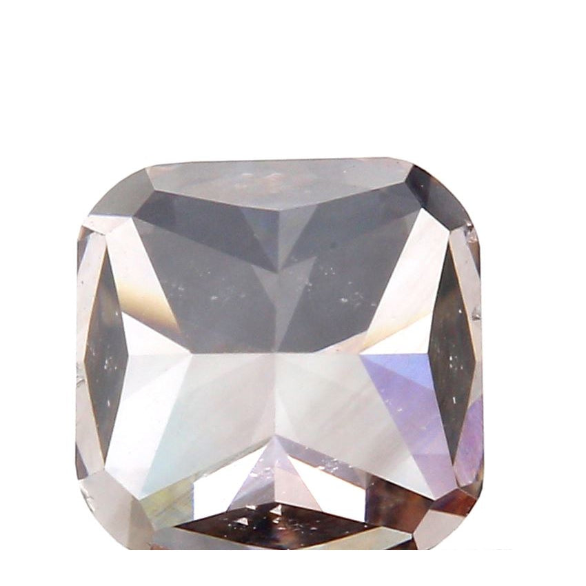 0.83ct cushion cut diamond with a fancy brownish pink hue and brilliant facets.