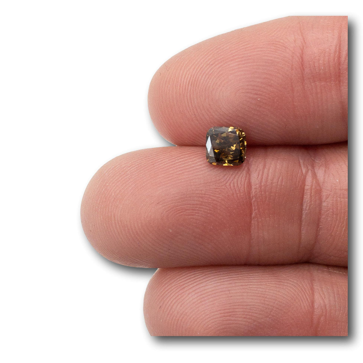 1.00ct Asscher cut fancy dark greenish brown diamond held between fingers, showcasing its step cut facets.