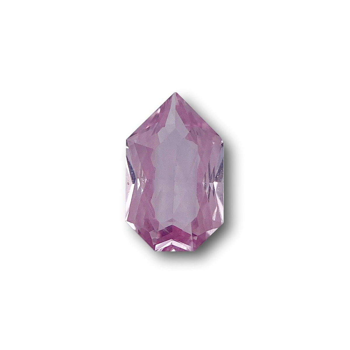 1.07ct brilliant cut pink sapphire with a unique shield shape, measuring 8.95 x 5.45 x 2.65 mm on a white background.