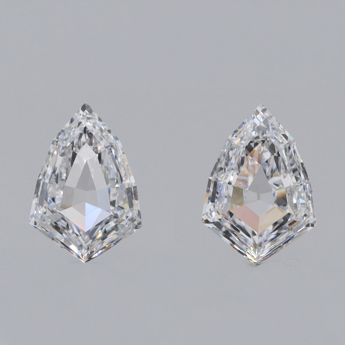 1.05cttw | D VVS Kite Shape Step Cut Diamond Matched Pair - Modern Rustic Diamond