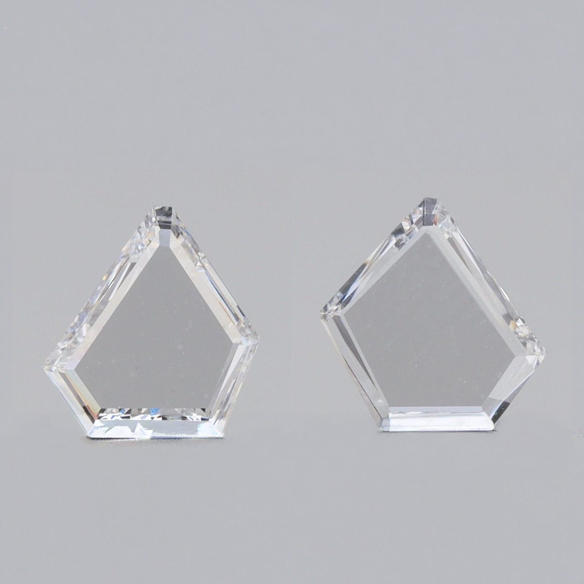 0.60cttw | E VVS Shield Shape Step Cut Diamond Matched Pair