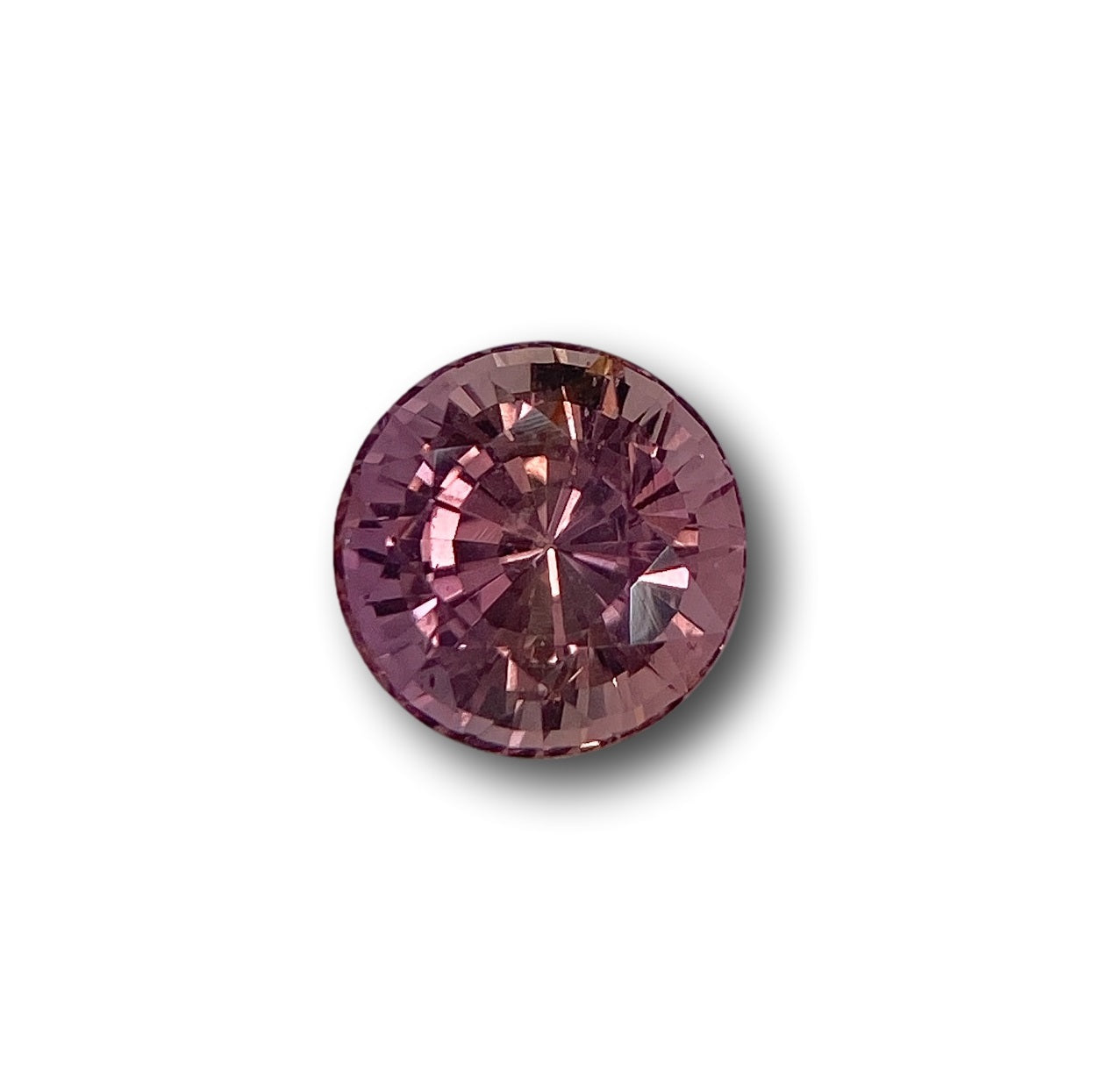 1.72ct round brilliant cut pink sapphire gemstone with faceted surface on a white background.