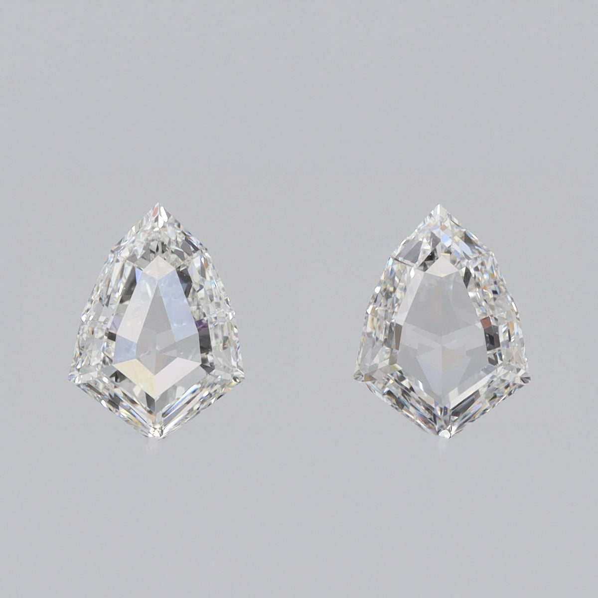 0.91cttw | D-E VVS-VS Kite Shape Step Cut Diamond Matched Pair - Modern Rustic Diamond