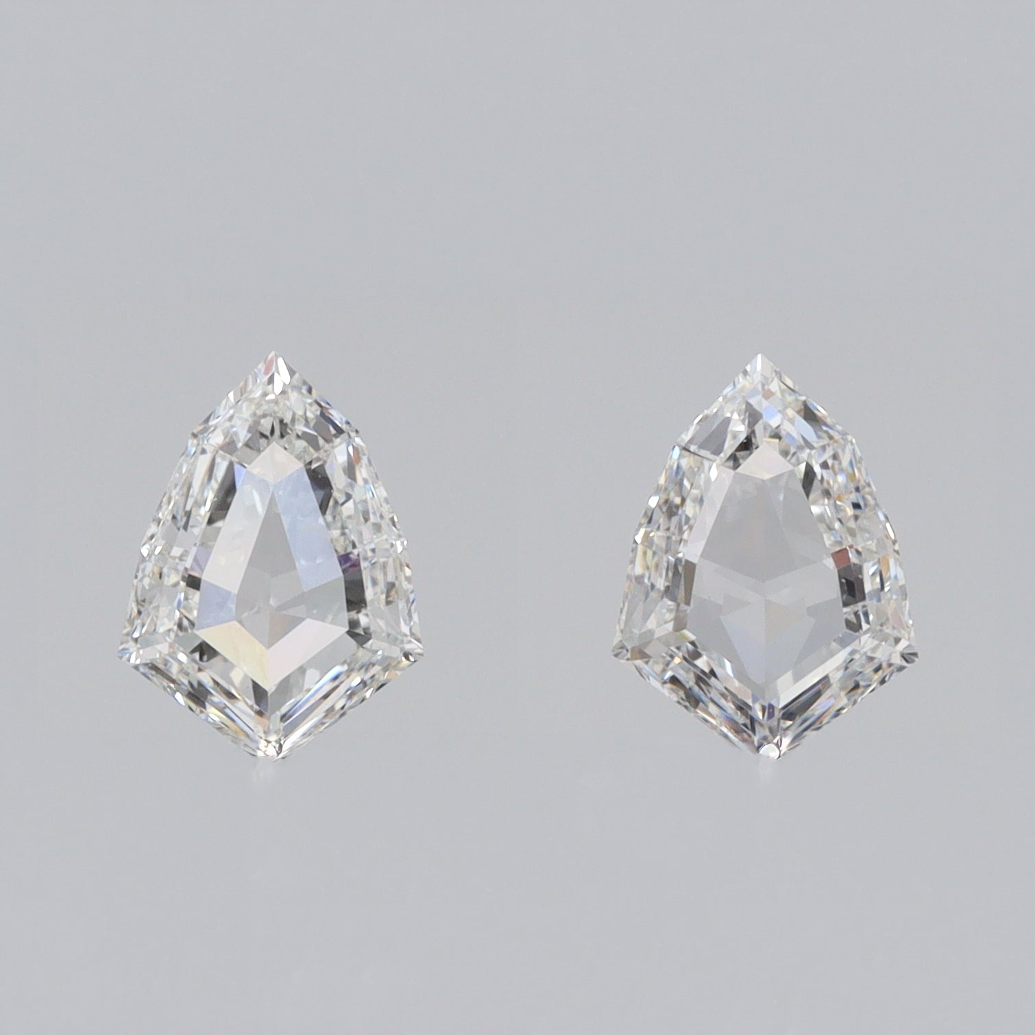 0.91cttw | D-E VVS-VS Kite Shape Step Cut Diamond Matched Pair - Modern Rustic Diamond