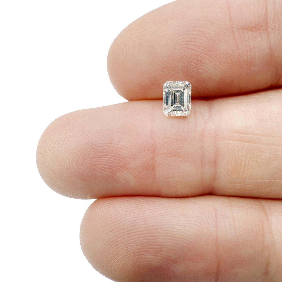 0.71ct | F/SI1 Emerald Shape Brilliant Cut Diamond (EGL USA) - Modern Rustic Diamond