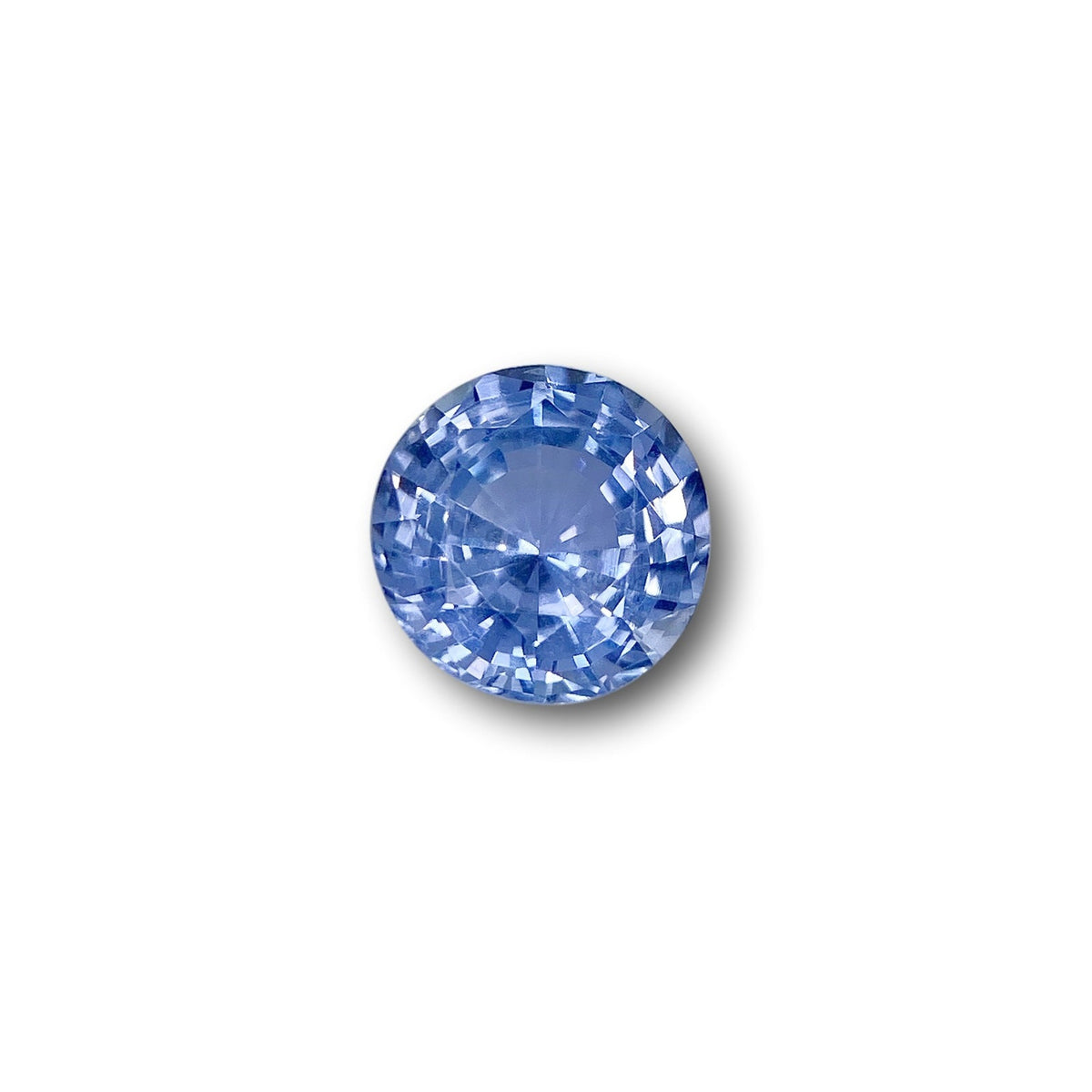 2.05ct round brilliant cut blue sapphire gemstone with faceted surface on a white background.