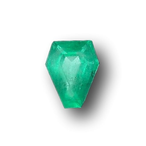 2.28ct Muzo Colombian emerald with a step-cut shield shape and vibrant green color on a white background.