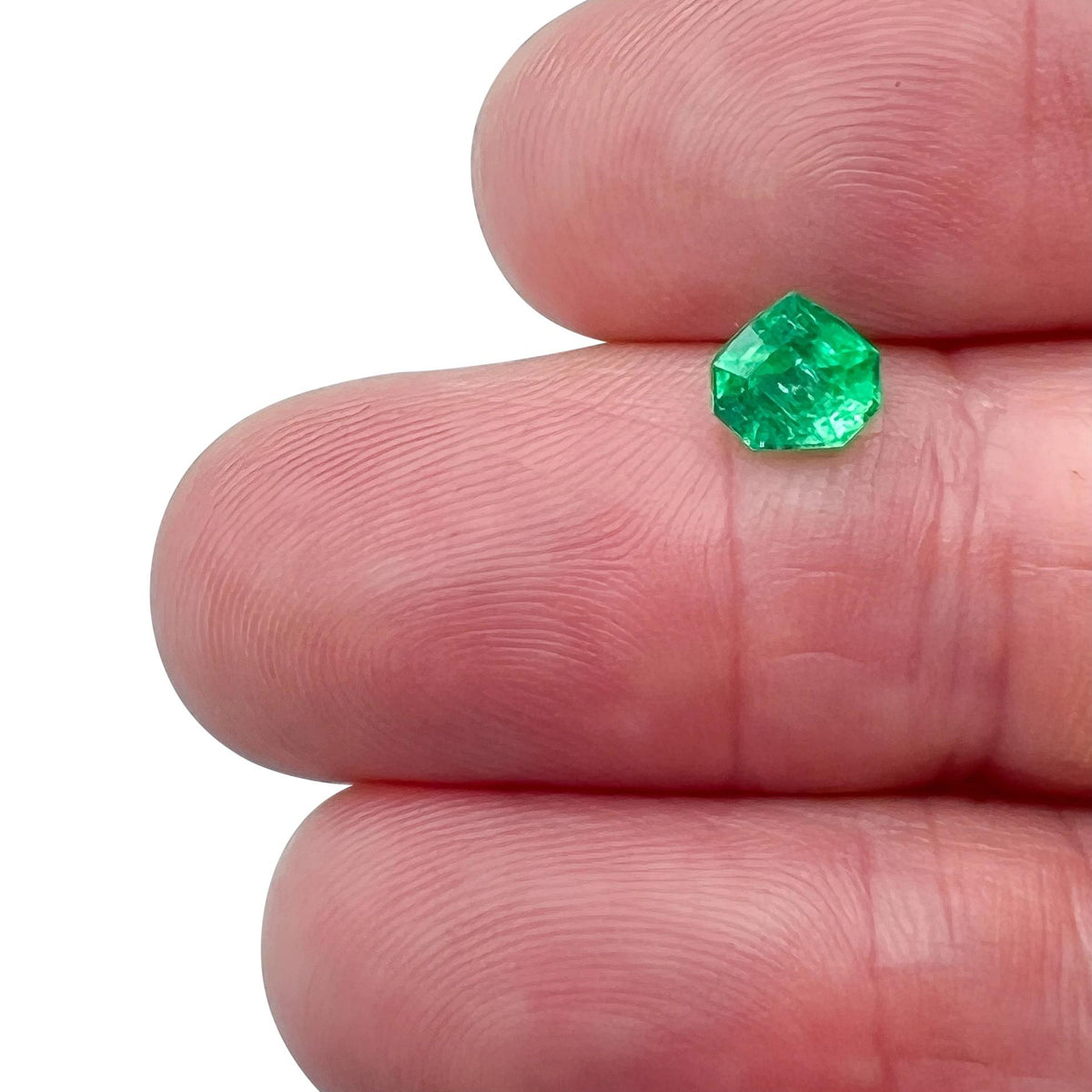 0.90ct | Step Cut Shield Shape Muzo Origin Emerald