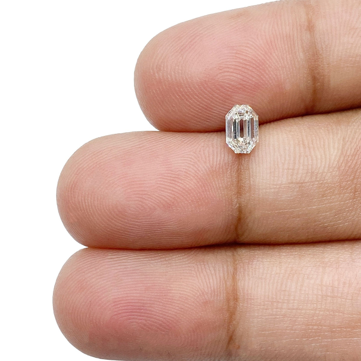 0.59ct | E-F/VS Emerald Shape Step Cut Diamond - Modern Rustic Diamond