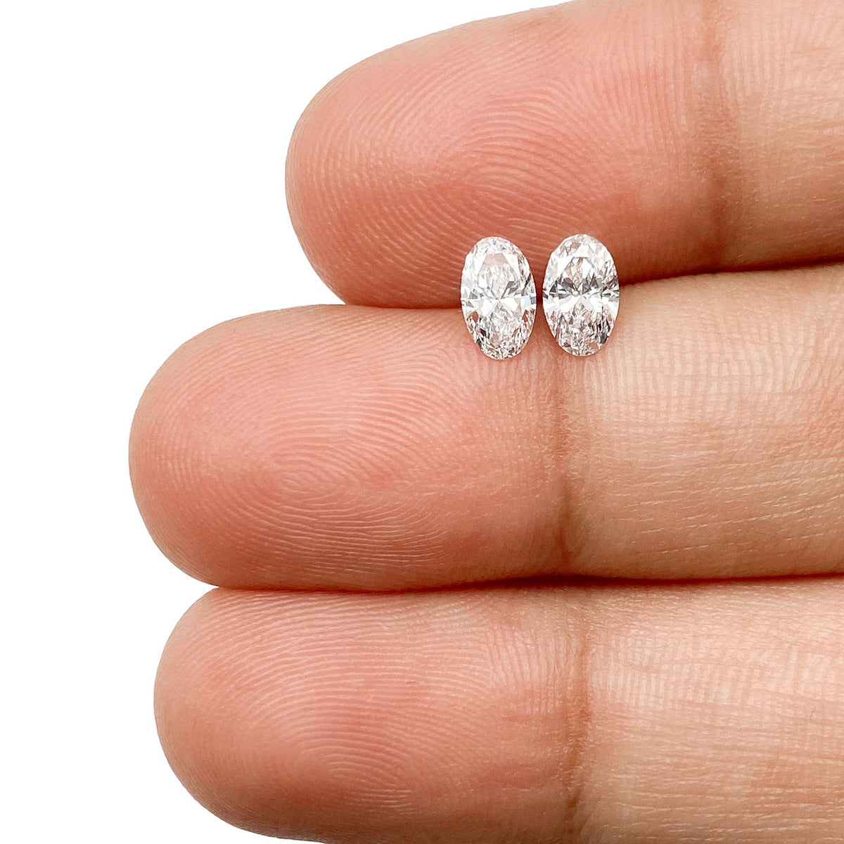 0.57cttw | D VVS Oval Shape Brilliant Cut Diamond Matched Pair - Modern Rustic Diamond
