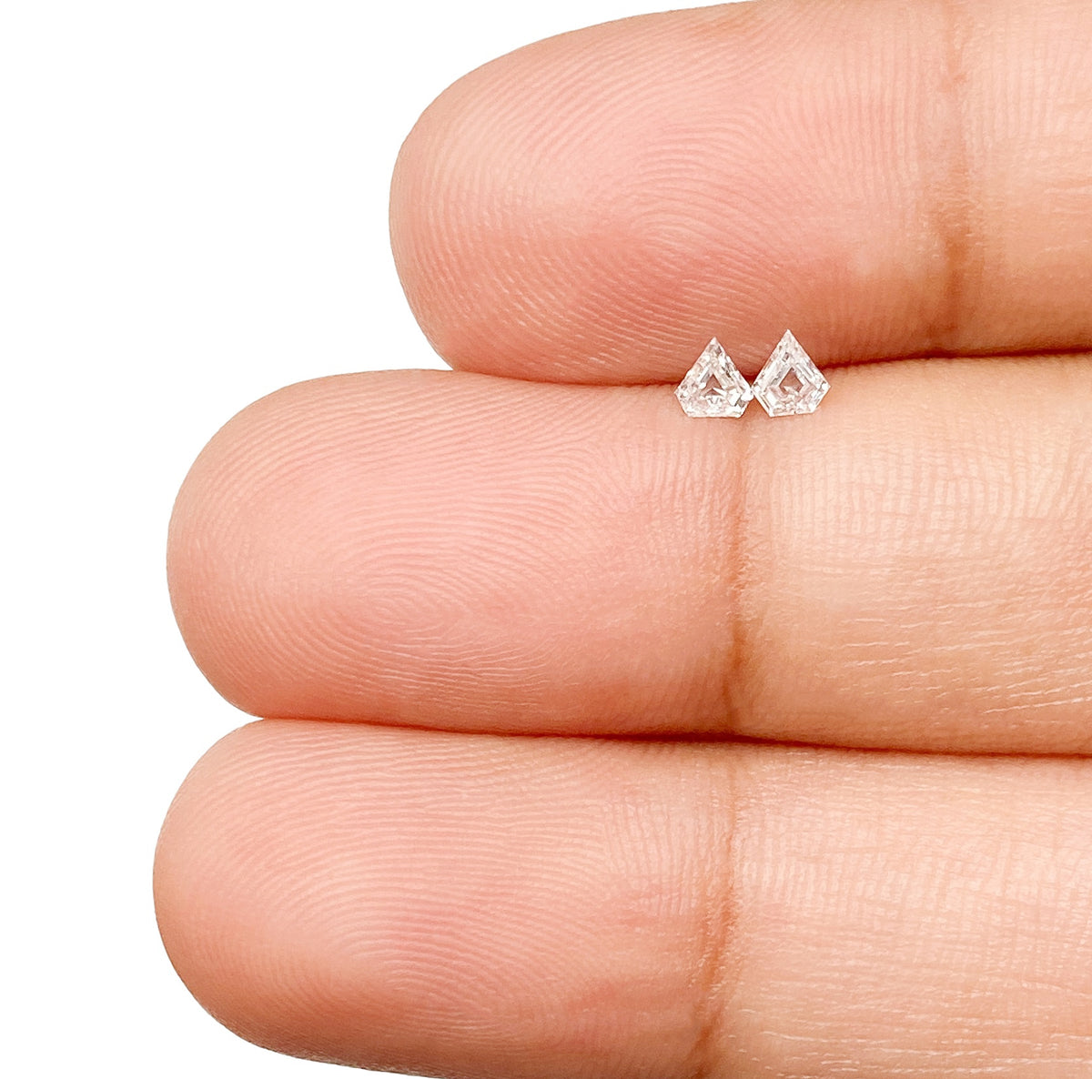 0.16cttw | E-F VVS Shield Shape Step Cut Diamond Matched Pair - Modern Rustic Diamond