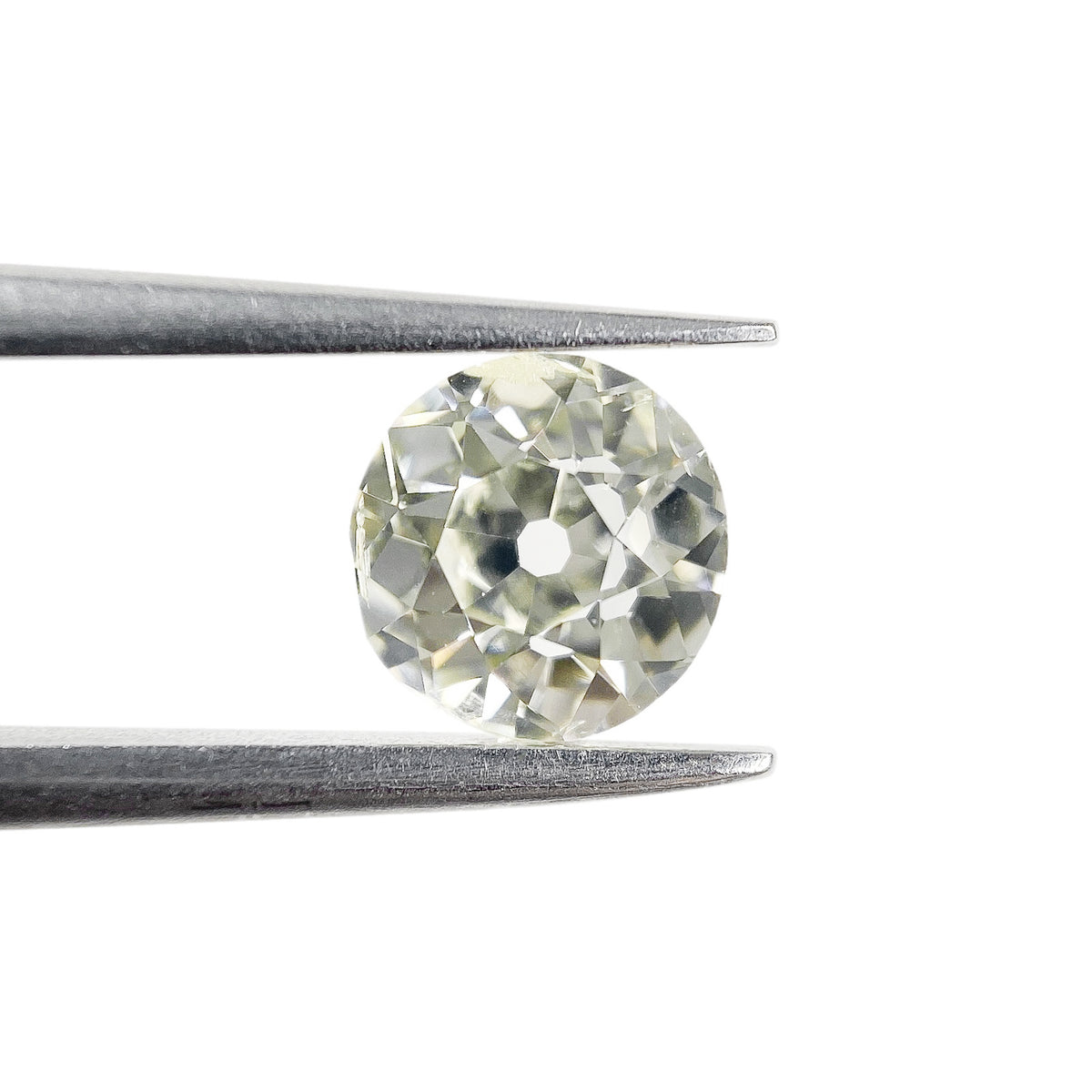 1.01ct | O-P/SI2 Round Shape Vintage Old European Cut Diamond (IGI) - Modern Rustic Diamond