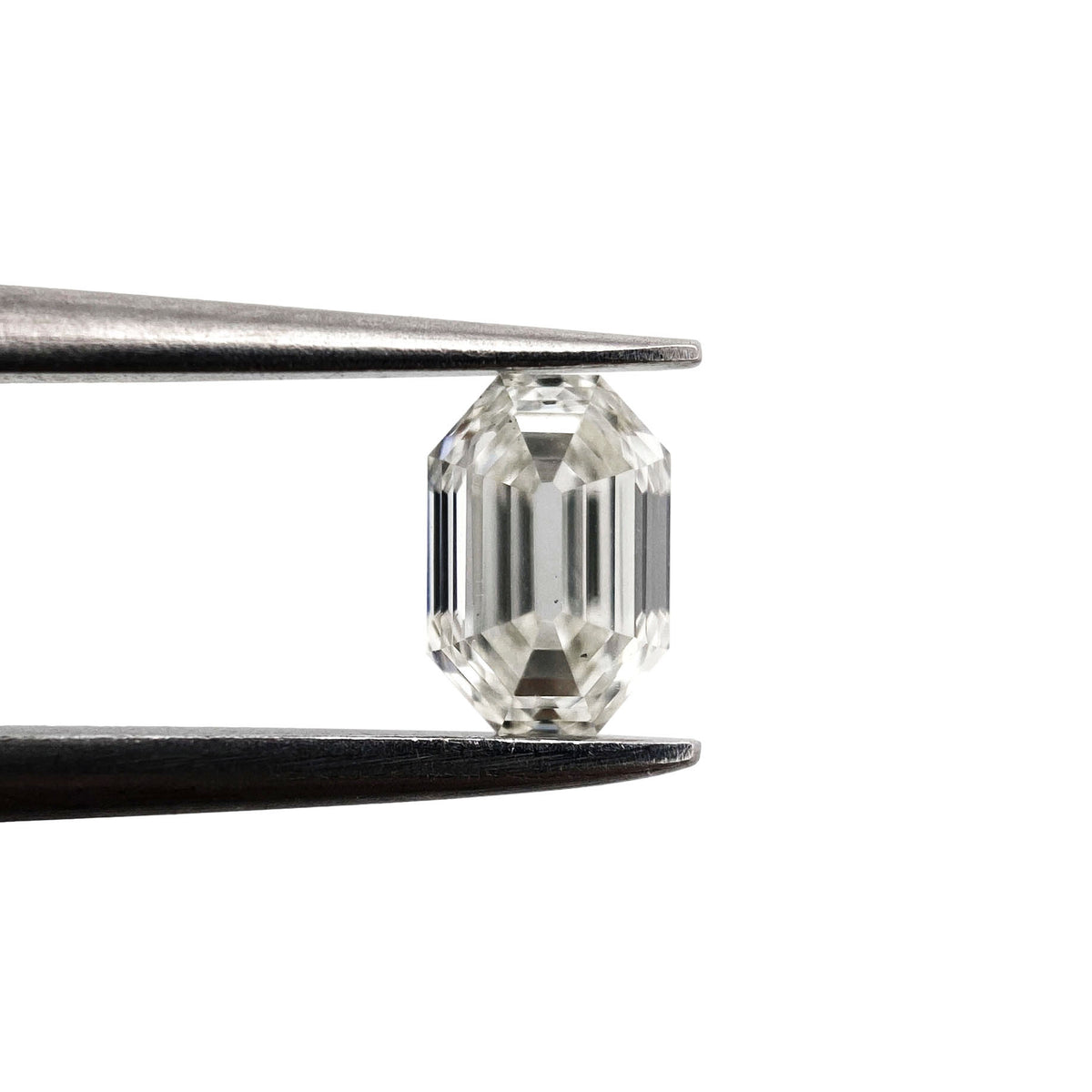 0.59ct | E-F/VS Emerald Shape Step Cut Diamond - Modern Rustic Diamond